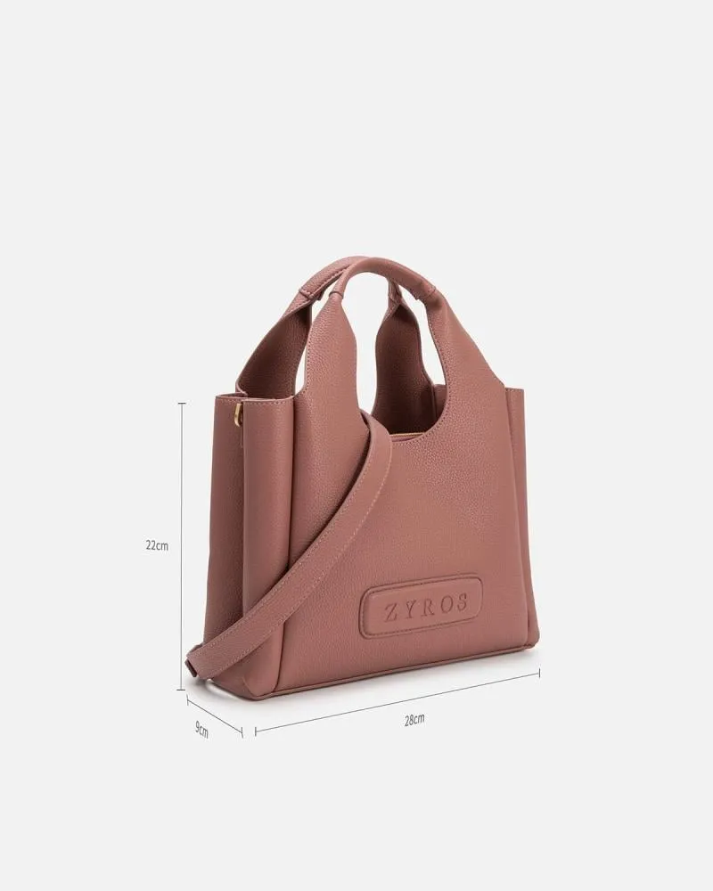 توفير شنطة أنيقة من الجلد بلون وردي من زايروس خلال ساعه أو ربما أقل مناسب جداً لتقديمة كهديه (بدون تنسيق)